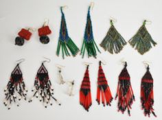 Seven pairs of Eleyne Williams beaded earrings including cinnabar lacquer and carved wood, crystal