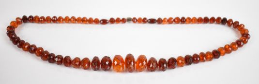 Art Deco copal amber necklace made up of faceted beads, with Victorian foiled clasp