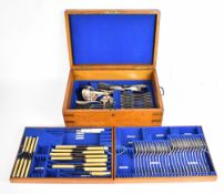 Early to mid 20th century oak cased part canteen of silver plated fiddle pattern cutlery, width of