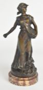 Bronze figure of a woman scattering seed, raised on a marble plinth, impressed 'Rousseau' to base,