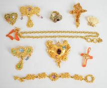 Eight pieces of Christian Lacroix jewellery including four brooches, bracelet, necklace, and two