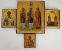 Four Russian / Christian Orthodox icons with pierced metal mounts, largest 32 x 26.5cm