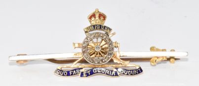 A 15ct gold Royal Artillery brooch set with rose cut diamonds and enamel, 4.3g, 4.8cm