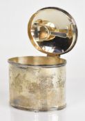 George Unite George V hallmarked silver tea caddy of oval form with hinged lid opening to reveal the