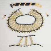 Two Eleyne Williams beaded necklaces including 'Galliard' made up of inlaid bone beads, bone disc