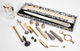 Hallmarked silver items comprising hinged top dressing table bottle, pencil holder and three
