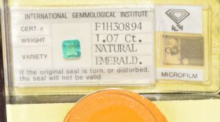 1.07ct emerald in perspex case