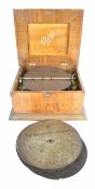 Early 20th century walnut cased Mira musical box with floral inlay, together with fourteen 12 inch