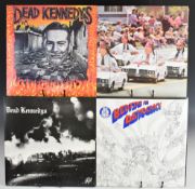 Nine Dead Kennedys LPs. Bedtime for Democracy with 'Fuck Facts' newspaper, Fresh Fruit for Rotting