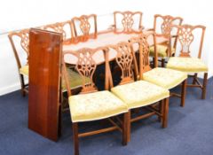 Regency style dining table with two additional leaves and ten (2+8) upholstered chairs, dimensions