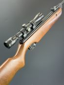 Cometa 300 .22 air rifle with semi-pistol grip, raised cheek piece and Hawke Sport HD 4x32 scope,