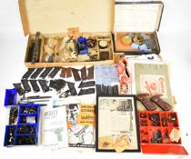 A large collection of mainly Webley air pistol spare parts, accessories and ephemera including