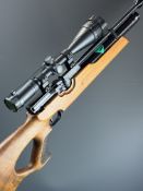 Weihrauch HW100 .22 PCP air rifle with textured thumb-hole grip, adjustable trigger, two 14-shot