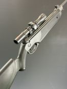 Beeman 2060 .177 air rifle with composite stock, chequered semi-pistol grip and forend, raised cheek