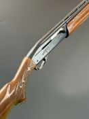 Remington Model 1100 .410 3-shot semi-automatic shotgun with ornately carved and chequered semi-
