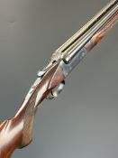 AYA 20 bore side by side ejector shotgun with border engraved locks underside, trigger guard, top