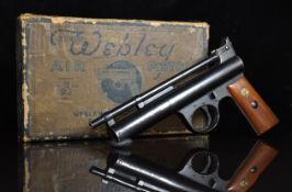 Webley Mark I double spring-clip .177 air pistol with monogrammed wooden grips, frame stamped '