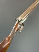 S&C Smith of London 14 bore side by side hammer action shotgun with grip safety, named and