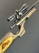 Crosman AS2250 King Ratcatcher CO2 air rifle with custom laminate show wood stock decorated with a