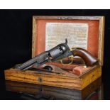 Colt .32 six-shot single action pocket revolver with brass trigger guard and grip strap, engraved