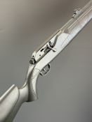 Umarex 850 AirMagnum .22 CO2  air rifle with composite stock, textured semi-pistol grip, raised