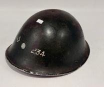 WWI Metal helmet with numbers 234 painted on the front