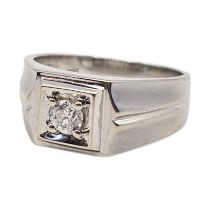 A VINTAGE 18CT GOLD AND DIAMOND SOLITAIRE RING Having a single round cut diamond in an Art Deco