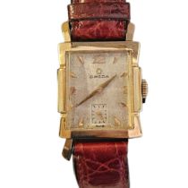 OMEGA, TANK, A MID CENTURY 14CT GOLD MID SIZE GENT’S WRISTWATCH The rectangular form with flared