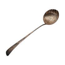 A LARGE GEORGIAN SILVER SOUP LADLE Having a shell form bowl and classical engraved decoration,