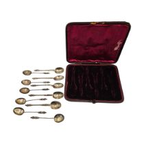 A SET OF VICTORIAN SILVER APOSTLE SPOONS Having figural finials hallmarked Birmingham, 1902,
