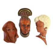 A COLLECTION OF THREE MID 20TH CENTURY TERRACOTTA WALL BUSTS To include a Goldschieder draped female