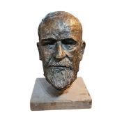 A 20TH CENTURY BRONZED MAQUETTE PORTRAIT BUST OF GEORGE BERNARD SHAW On a rectangular wooden