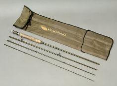 A Wychwood 'Aura' trout rod - 9ft four-piece, line rating 5, in its maker's nylon fitted sleeve.