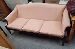 20TH CENTURY MAHOGANY FRAMED SETTEE ON REEDED SUPPORTS