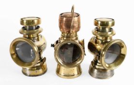 A Pair of Early 20th Century Lucas Number 141 and 143 Car Lamps 21cm high A Brass Lucas King of
