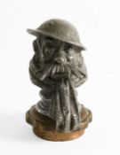 An Early 20th Century Car Mascot, in the form of Old Bill, bust profile, the helmet signed BRUCE