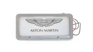 Aston Martin: A Rare Chromed Metal Illuminated Showroom Display Sign, the verso with paper label