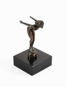 An Art Deco Bronze Car Mascot, modelled as a stylised nude female diver on a rock, the base