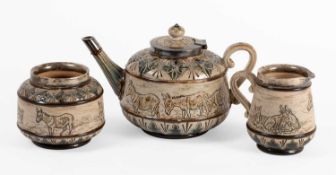A Doulton Lambeth Stoneware Tea Set, 19th century, by Hannah Barlow, with formal borders and