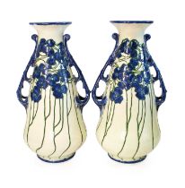 A Pair of Minton Secessionist Twin-Handled Vases, moulded and tubelined with stylised flowers, in