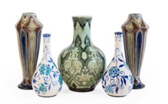 Frank A Butler (active 1872-1911): A Pair of Royal Doulton Lambeth Stoneware Vases, tubelined