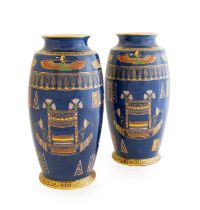 A Pair of Art Deco Wiltshaw & Robinson Ltd Carlton Ware Tutankhamun Egyptian Vases, on a powder blue