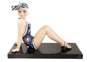An Art Deco Essevi Pottery Figure, from a model by Sandro Vachetti, modelled as a girl wearing a