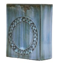 A Troika Pottery Slab Vase, covered in a blue glaze with a wax resist wheel design, painted TROIKA