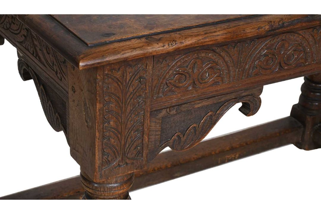 A Carved Oak Centre Table, circa 1700, of rectangular form, the five ...