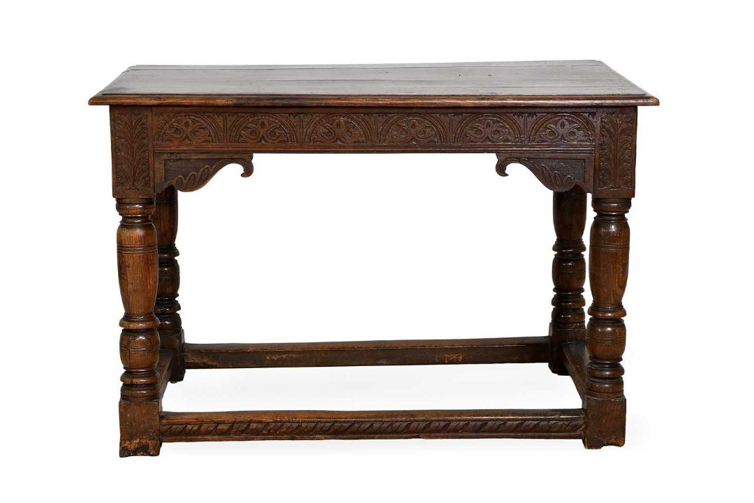 A Carved Oak Centre Table, circa 1700, of rectangular form, the five ...
