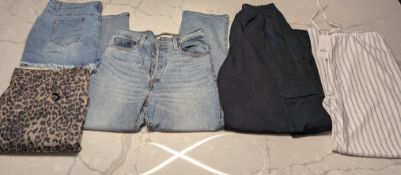 Levi, Motel, Urban Outfitters - A pair of Levi jeans, size 30, a pair of navy blue cargo trousers,