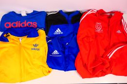 An Adidas 2012 London Marathon Staff jacket (L), an Adidas track top in yellow and blue (L),
