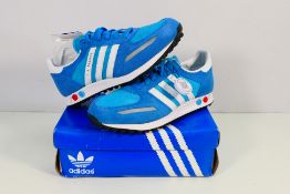 Adidas - A pair of LA Trainers in blue and white, UK size 10,