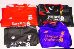 Liverpool Football Club - Four replica shirts, all with Standard Chartered sponsorship,
